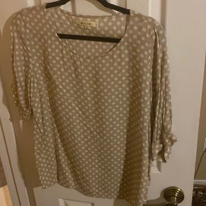 Tan polka dotted blouse